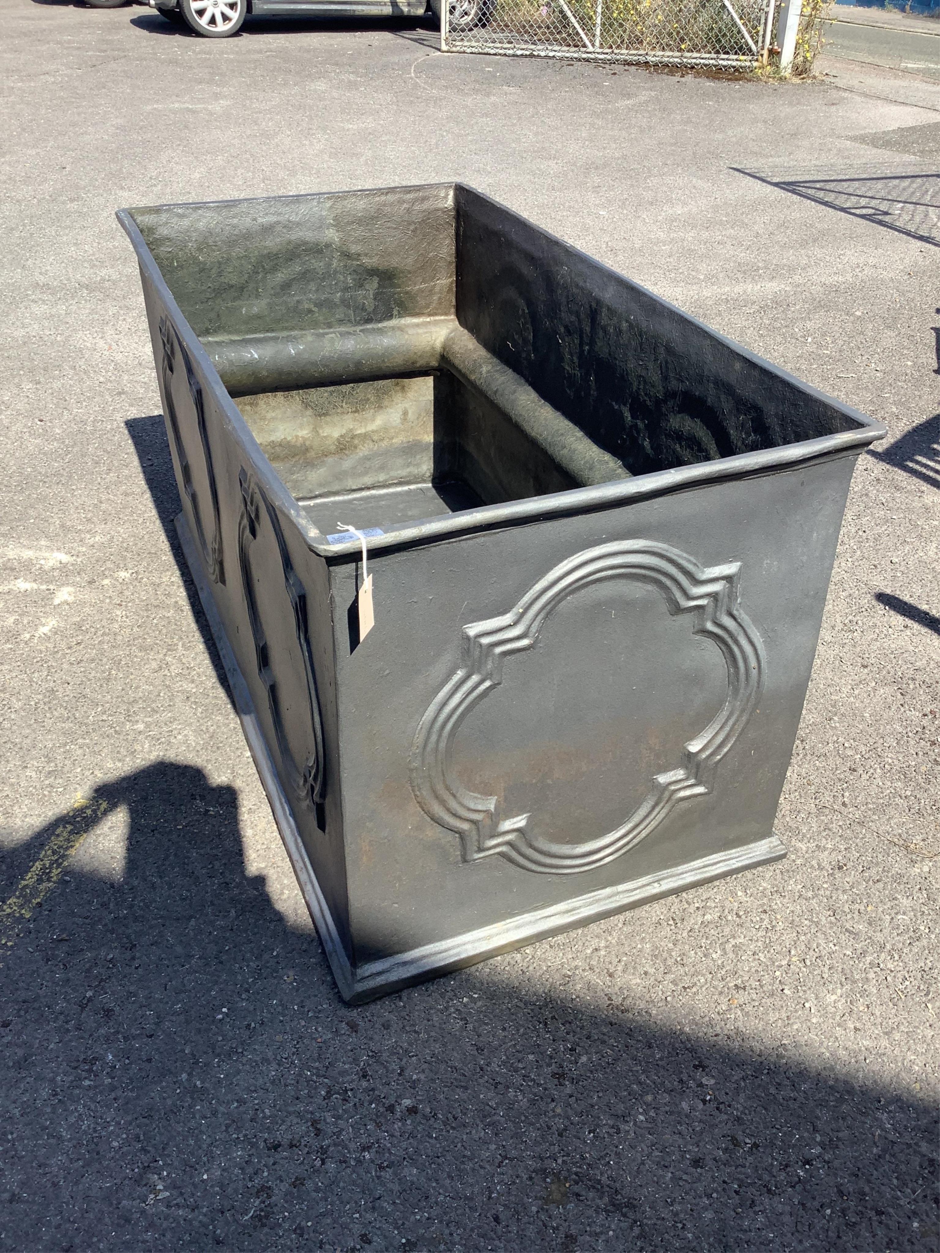 A George II style rectangular faux lead water cistern, width 150cm, depth 77cm, height 75cm. Condition - good